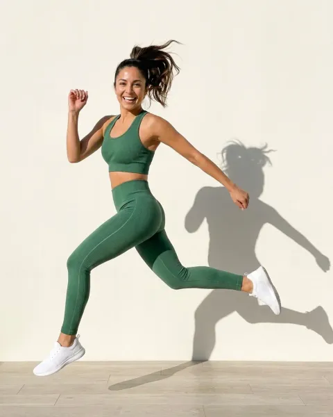 The same woman jumping in a white studio, made with DesignerBox