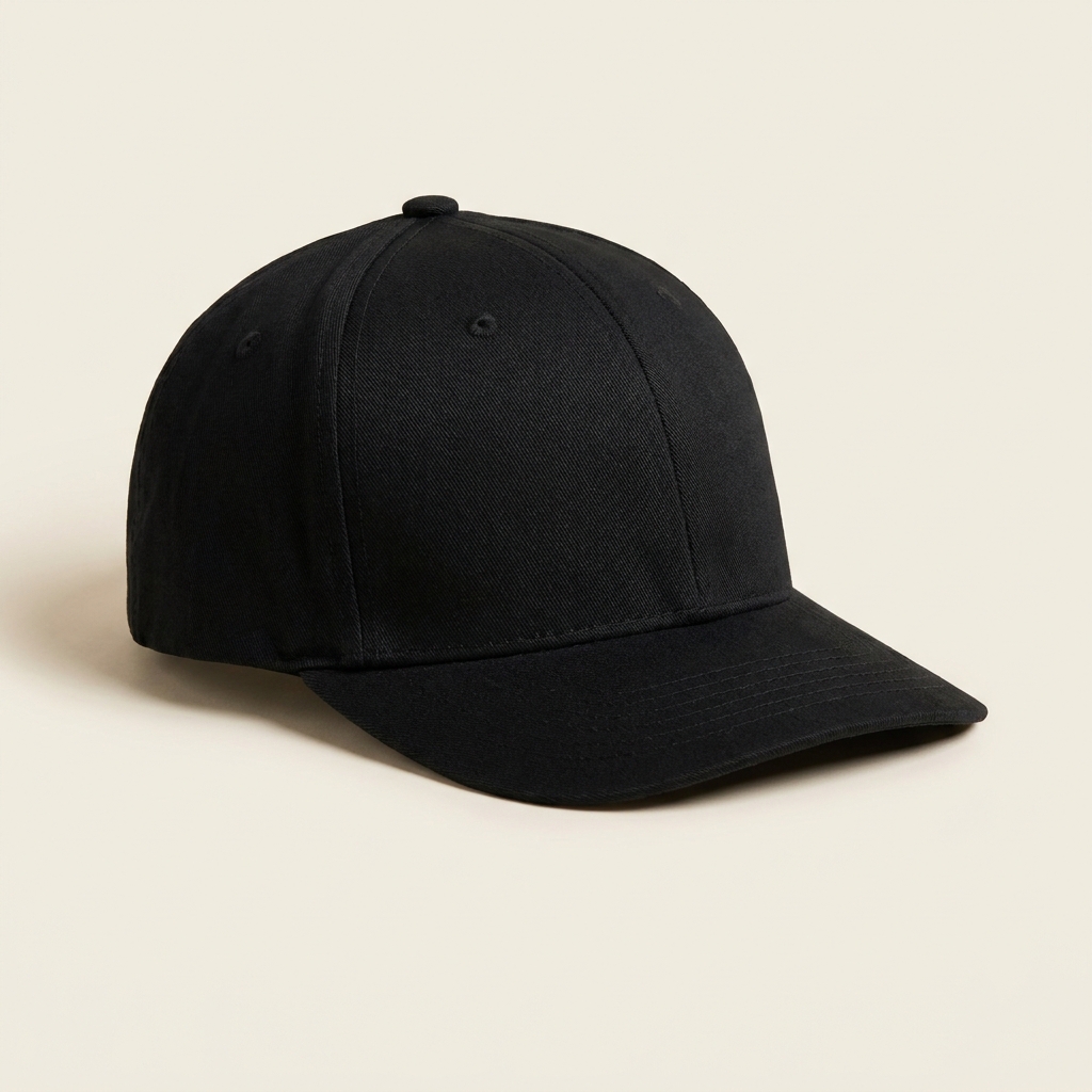 Black six-panel cap at three-quarter angle on a pale studio backdrop