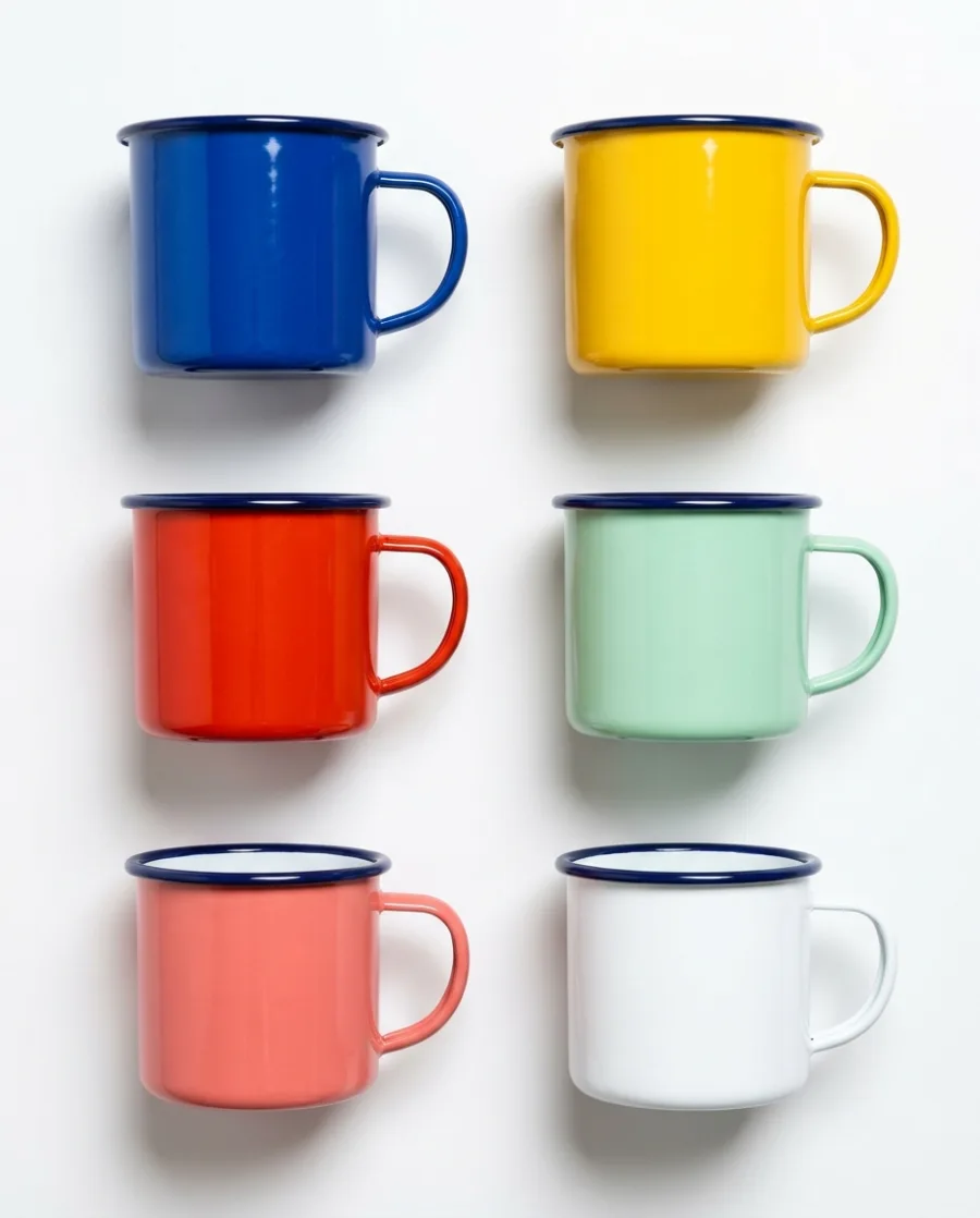 Six enamel camping mugs in blue, yellow, red, mint, coral and white in a grid on white, made with AI
