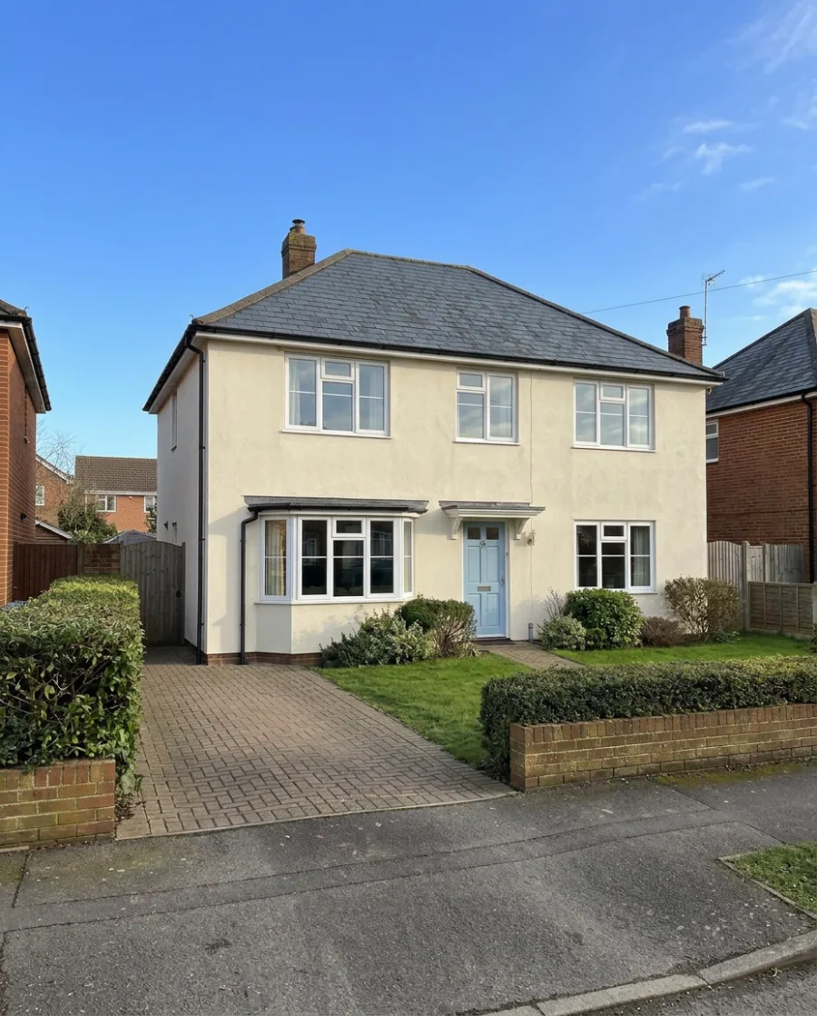 The front of the house on a sunny day: Bins removed, made with AI